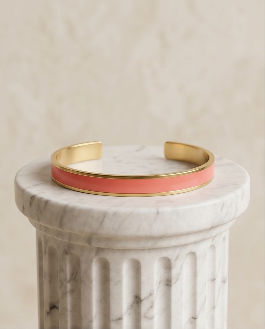 Esclava de acero dorado rígida color naranja